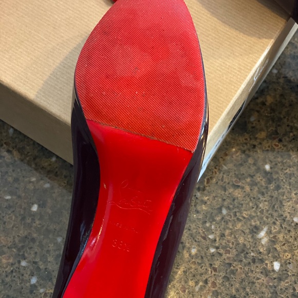 Wine colored Christian Louboutin gently used simple pump